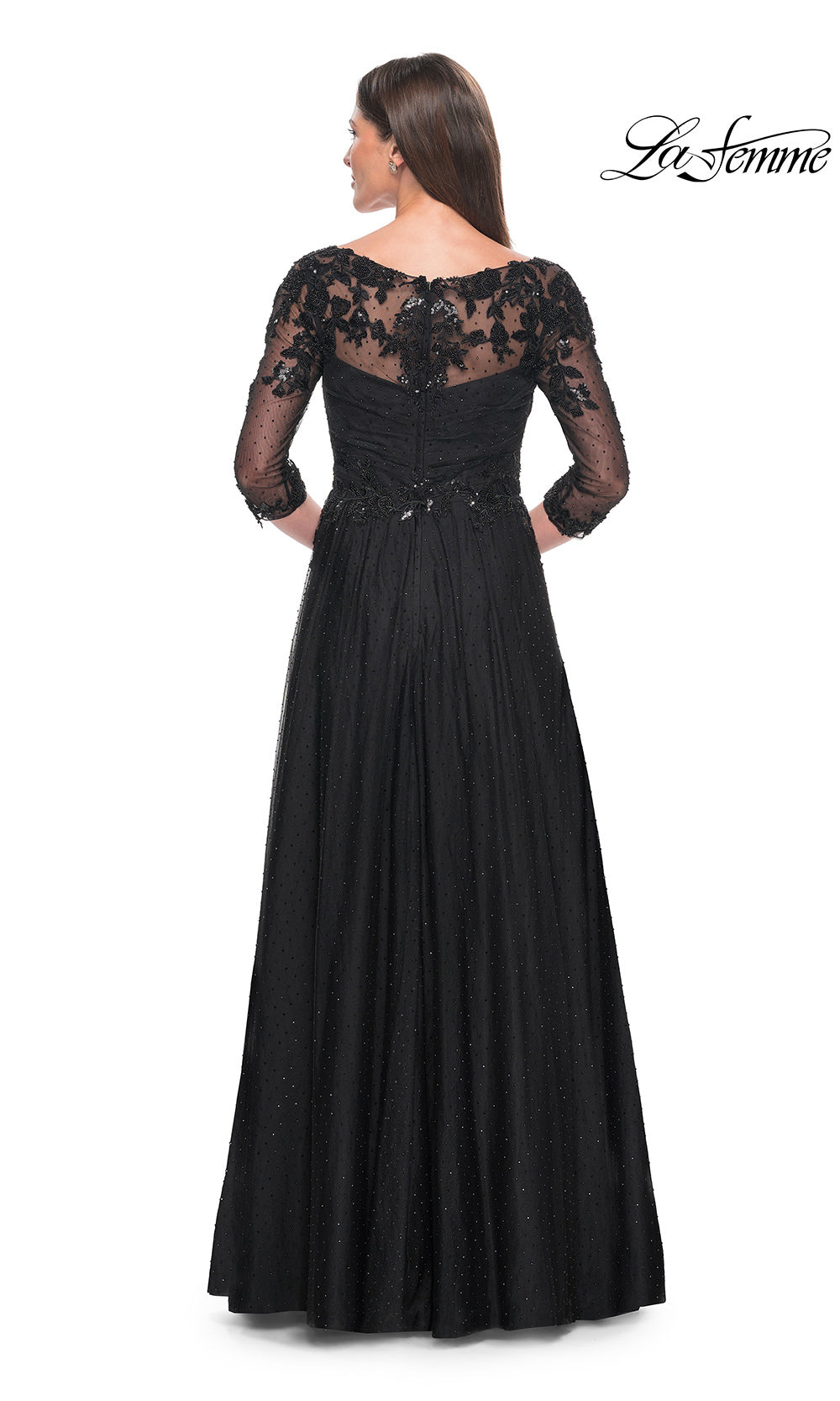 Black evening gown with lace detailing on a white background
