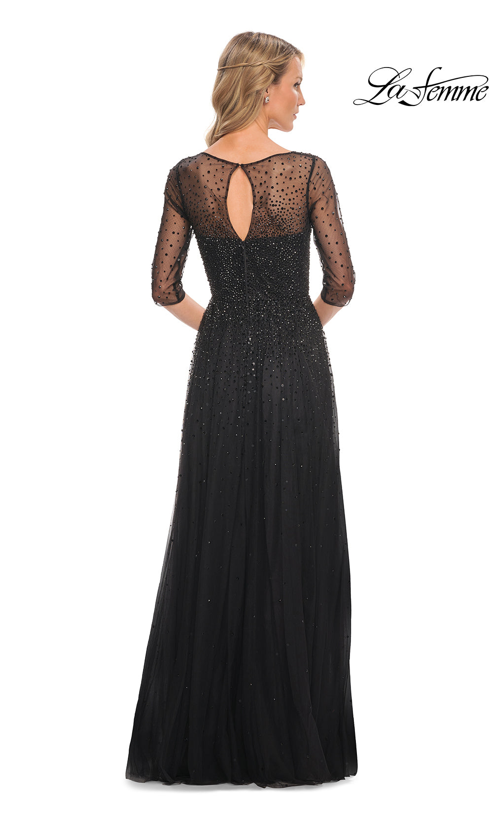 Black evening gown with sheer sleeves and open back on a white background