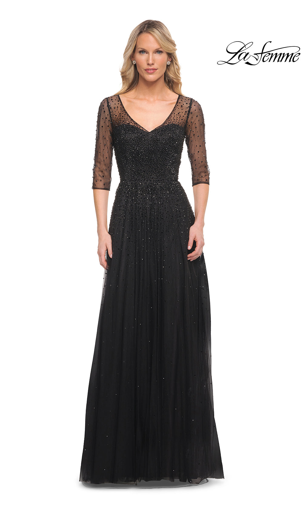 Black evening gown with lace detailing on a white background