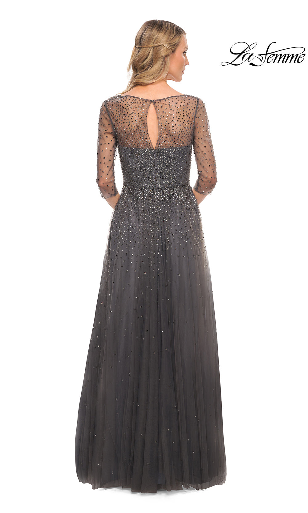 Black evening gown with sheer sleeves and open back on a white background