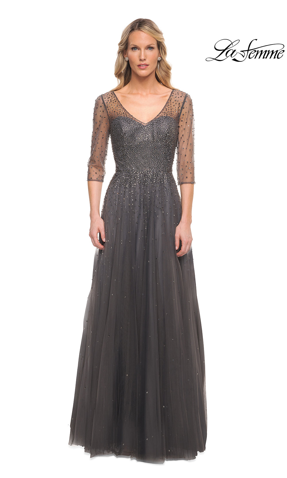 Long dark evening gown with lace sleeves on a white background