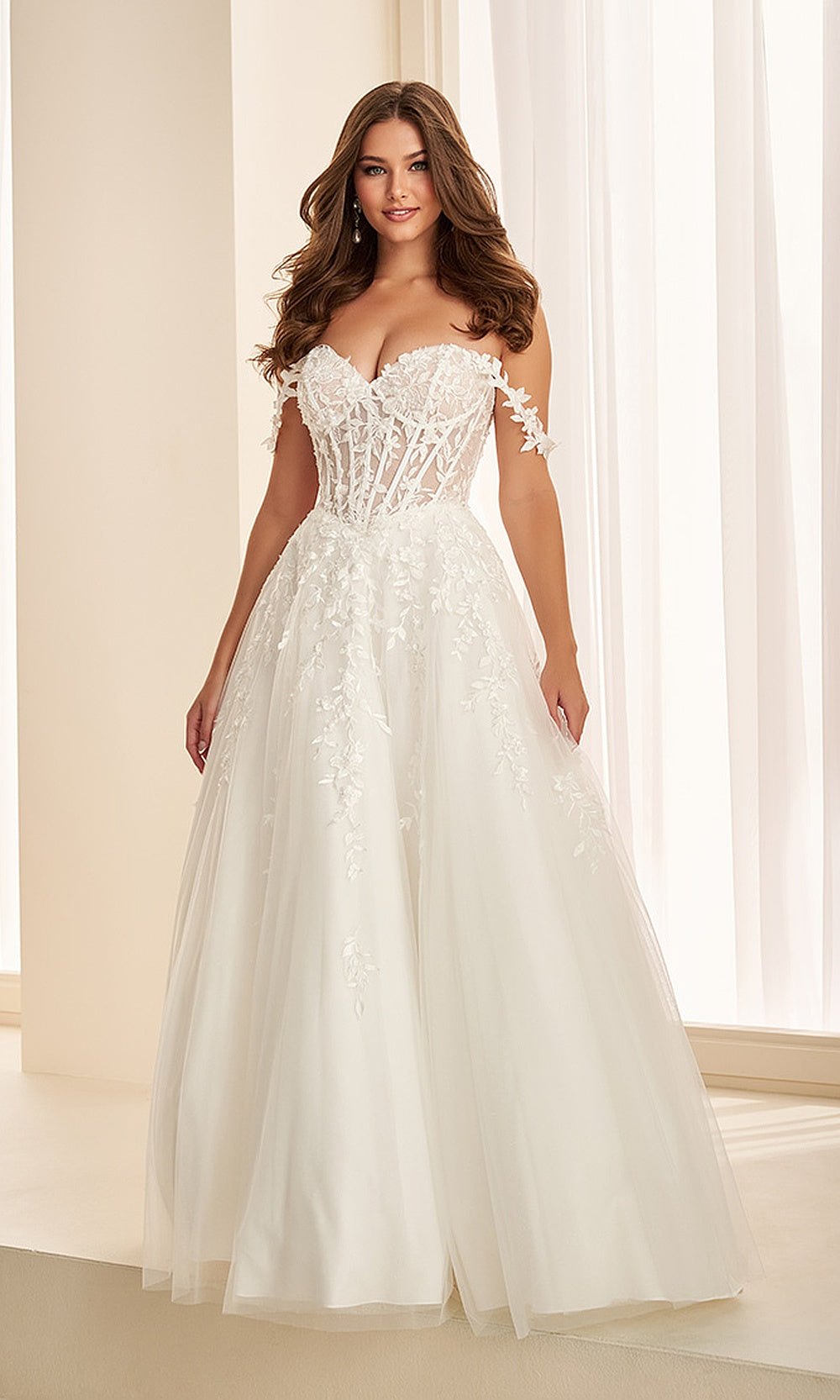 Ellie Wilde EW37028 Diamond White prom dress front view with glitter tulle, embroidered floral appliqués, off-shoulder sweetheart neckline, boned corset ballgown silhouette, pageant-ready gown.