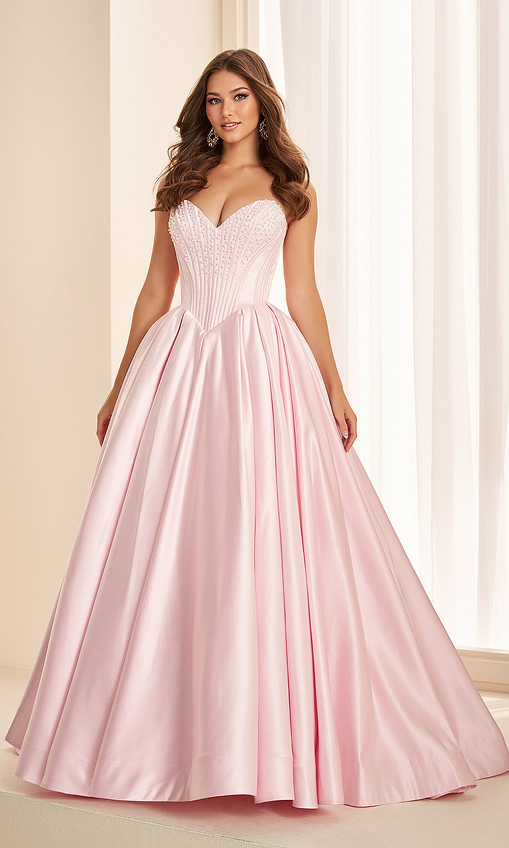 Ellie Wilde EW38020 Light Pink prom dress front view with beaded satin, strapless sweetheart neckline, ballgown silhouette, romantic evening gown.