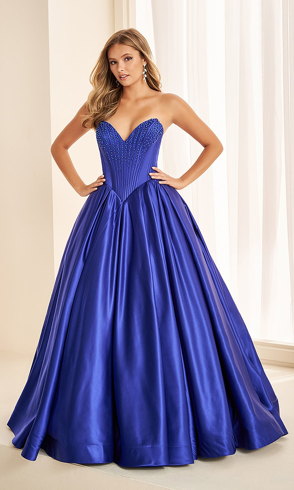 Ellie Wilde EW38020 Royal Blue prom dress front view with beaded satin, sweetheart neckline, ballgown silhouette, show-stopping pageant-ready gown.