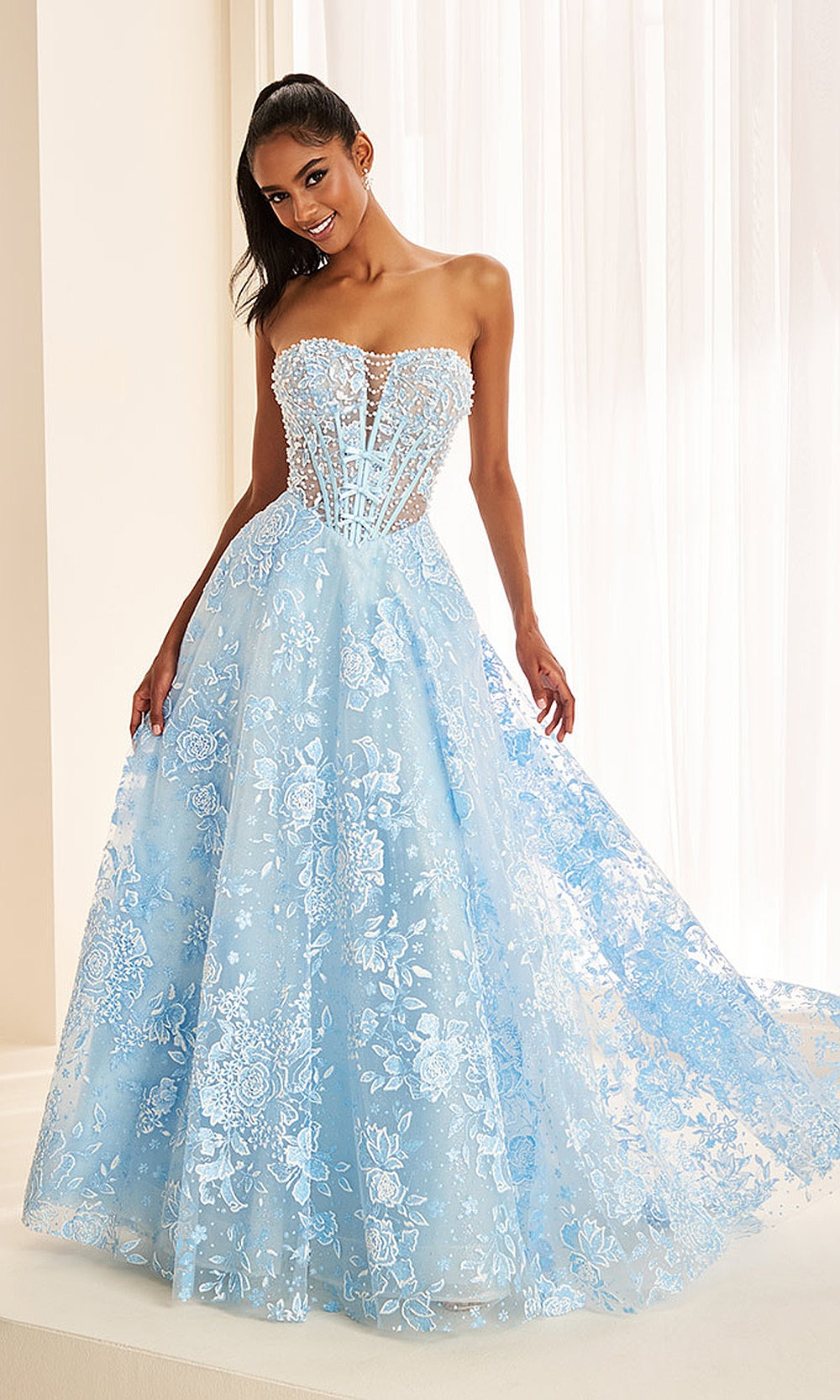 Ellie Wilde EW38046 Light Blue prom dress front view with glitter tulle, floral appliques, strapless sweetheart corset ballgown, formal prom gown.