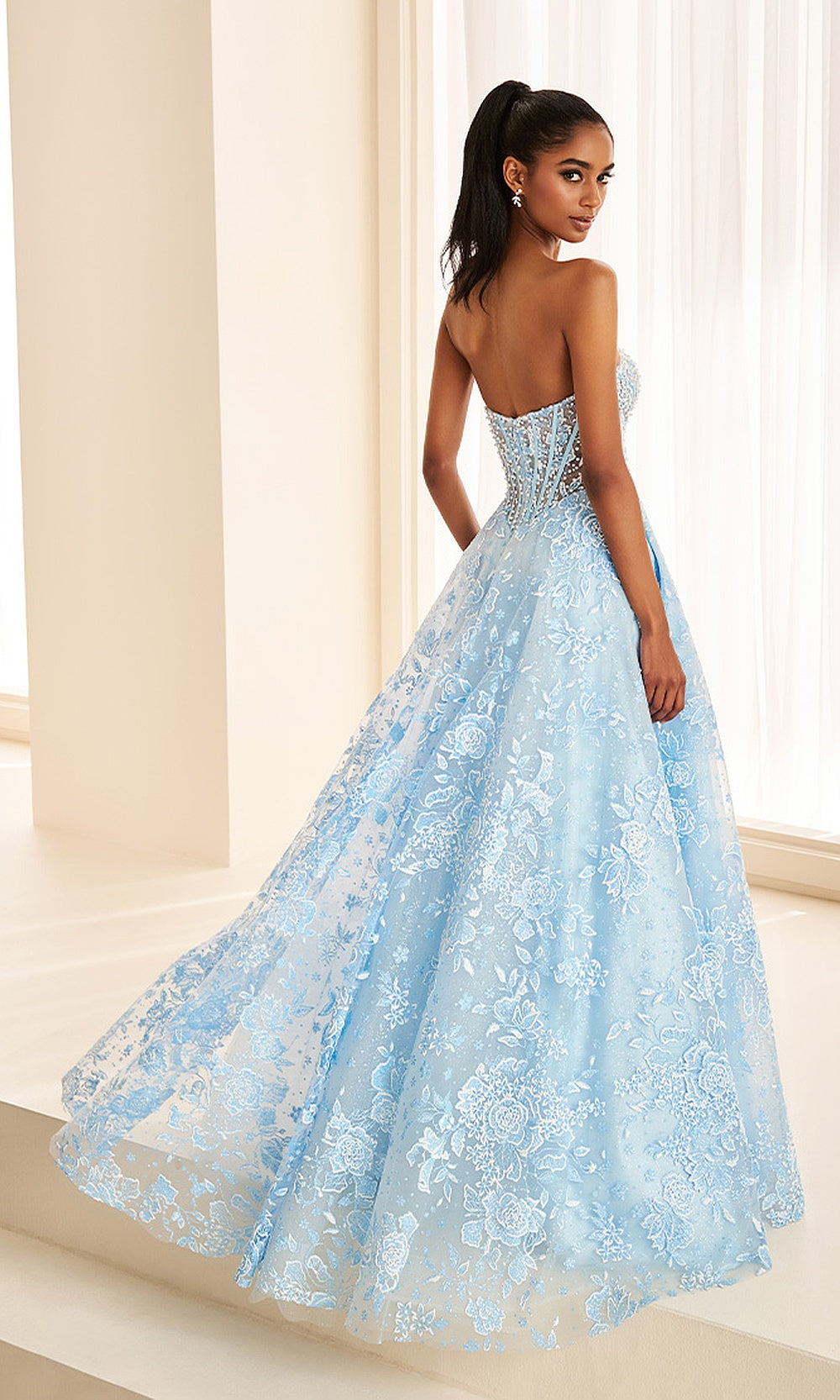 Ellie Wilde EW38046 Light Blue prom dress back view with lace and beading, illusion corset back, sweetheart ballgown silhouette, elegant evening gown.