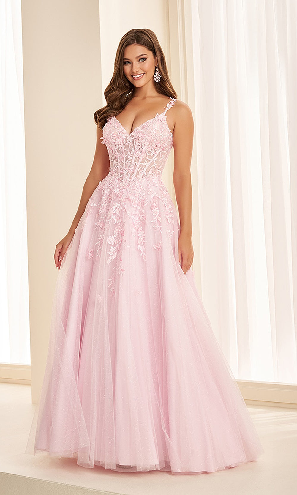 Ellie Wilde EW38060 Light Pink prom dress front view with glitter tulle full skirt, v-neck straps, floral appliqué A-line ballgown, sweet 16 ball gown