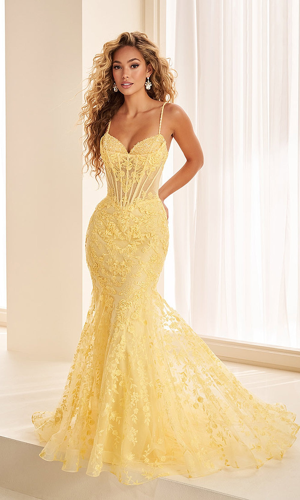 Ellie Wilde EW38094 Yellow prom dress front view with lace and tulle, floral appliques, sweetheart mermaid silhouette, formal prom gown.