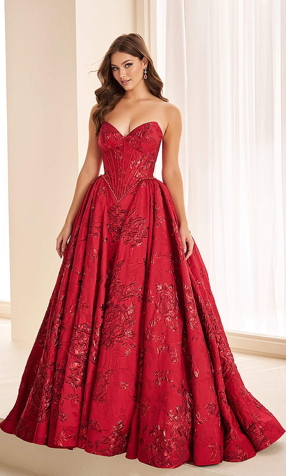Ellie Wilde EW38100 Red prom dress front view with jacquard print fabric, strapless sweetheart neckline, boned corset bodice, and full ballgown silhouette, formal prom gown.