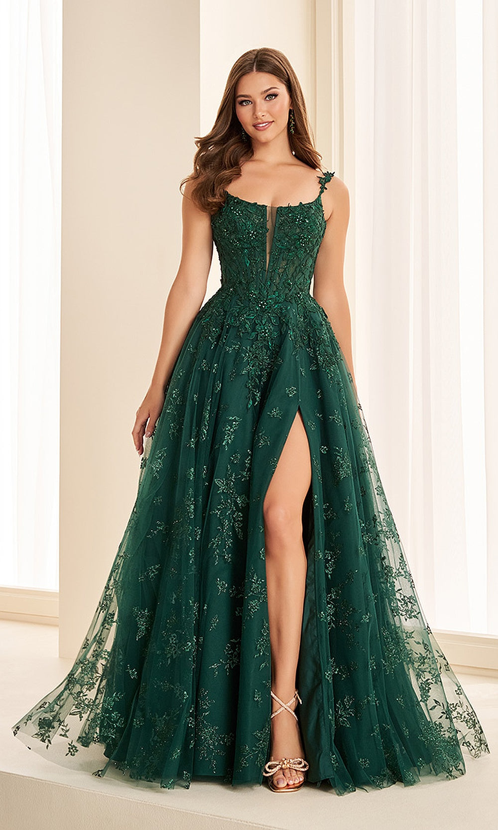 Ellie Wilde EW38136 Emerald prom dress front view with glitter tulle, lace floral appliques, sweetheart corset bodice, and high slit, a stunning pageant-ready gown.