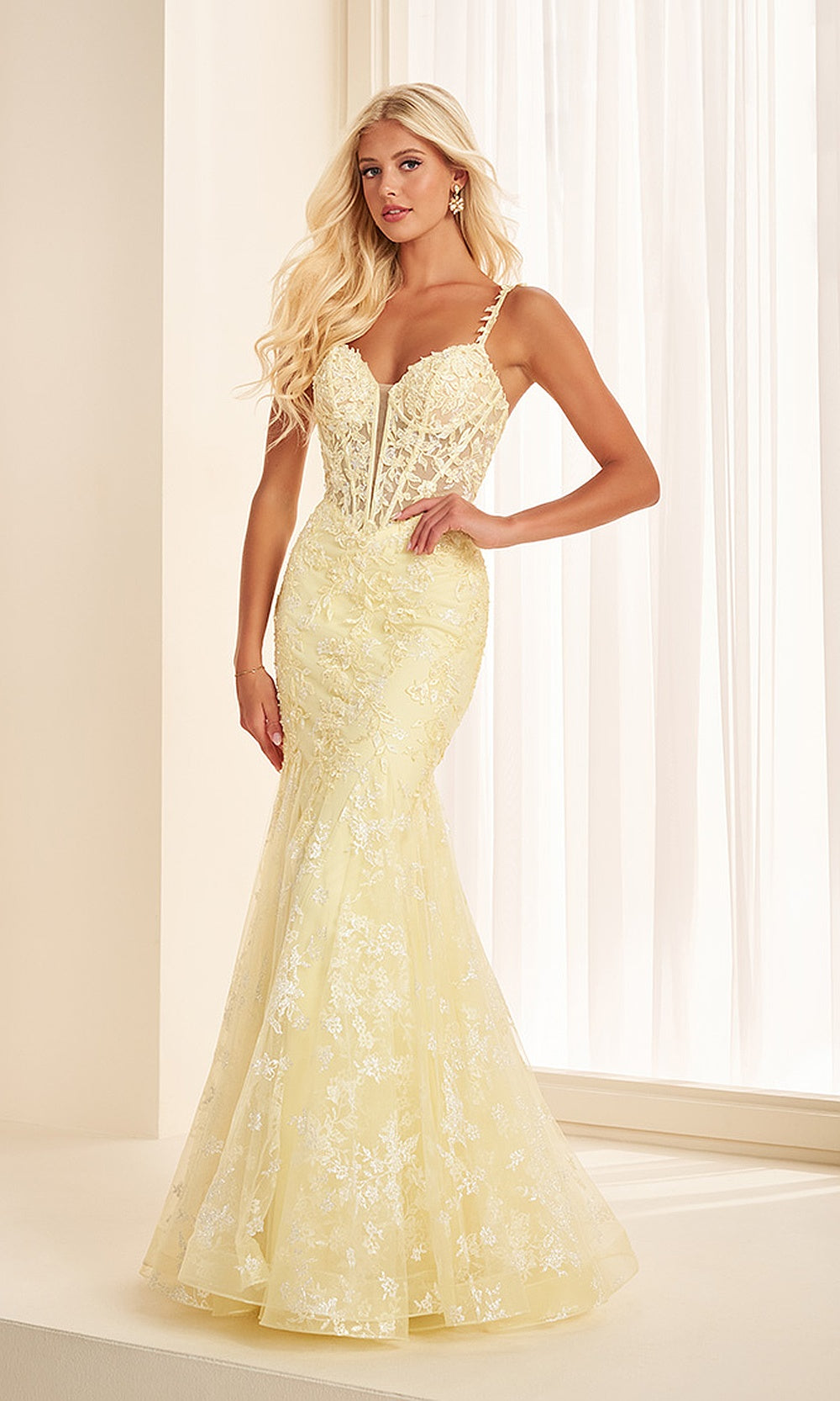 Ellie Wilde EW38138 Light Yellow prom dress front view with lace and tulle, beading and sweetheart neckline, fitted mermaid silhouette, black tie event dress.