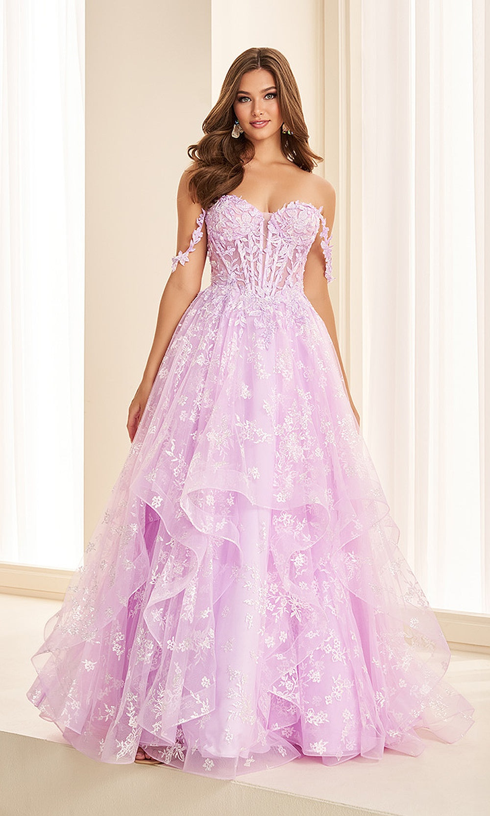 Ellie Wilde EW38204 Lilac prom dress front view with beaded sequin lace, floral embroidery appliques, strapless sweetheart corset bodice, and full ruffle tulle ballgown skirt, black tie event dress.
