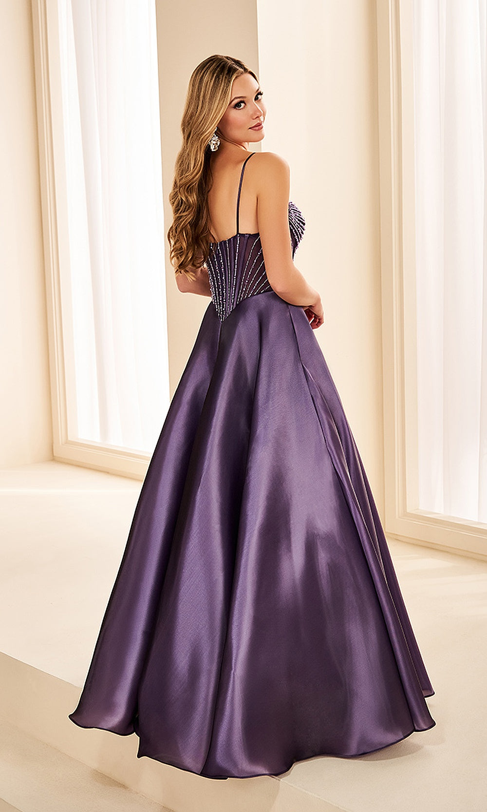 Ellie Wilde EW38209 Frosted Grape prom dress back view with liquid satin, open-back straps and boned corset, A-line silhouette, evening gown.
