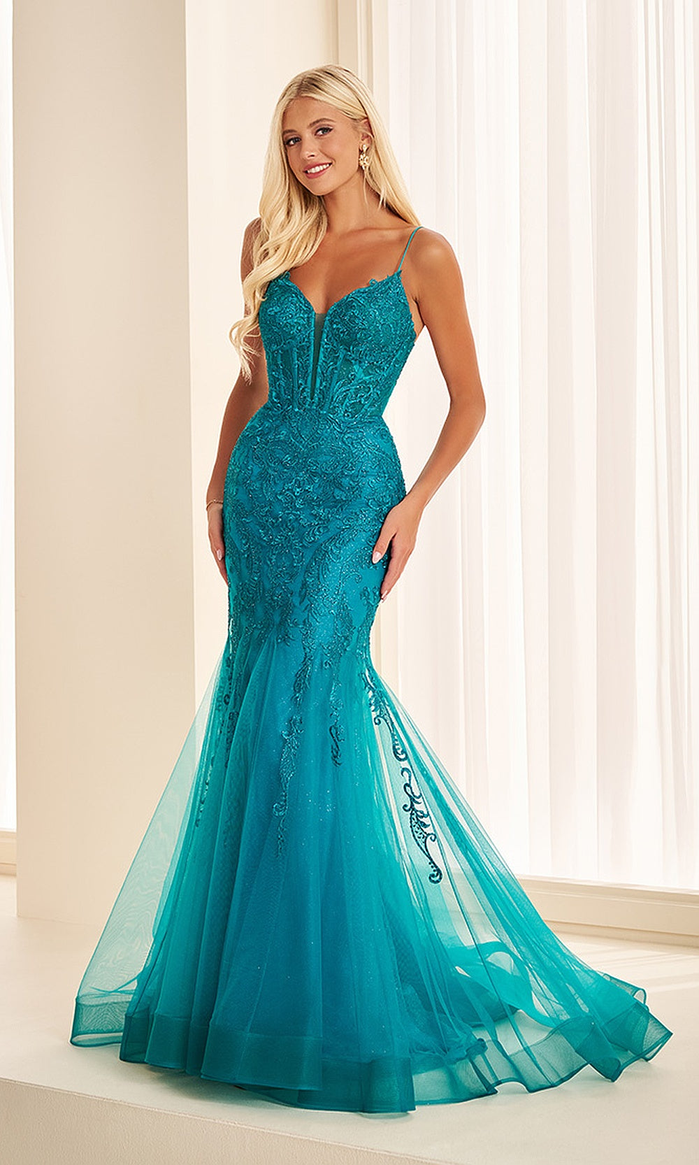 Ellie Wilde EW38213 Teal prom dress front view with glitter tulle, lace appliqués, sweetheart neckline, and fitted mermaid silhouette — a pageant-ready gown.
