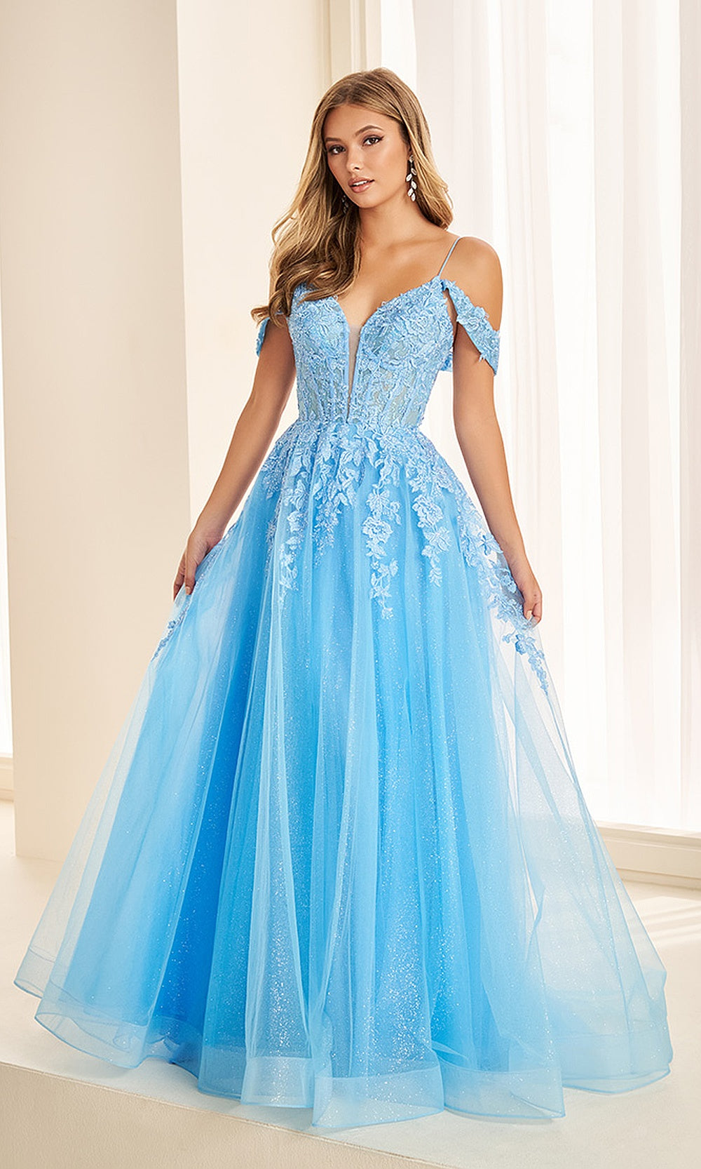 Ellie Wilde EW38219 Bluebell A-Line prom dress front view with glitter tulle and lace, sweetheart corset bodice, floral appliques, pageant-ready gown.