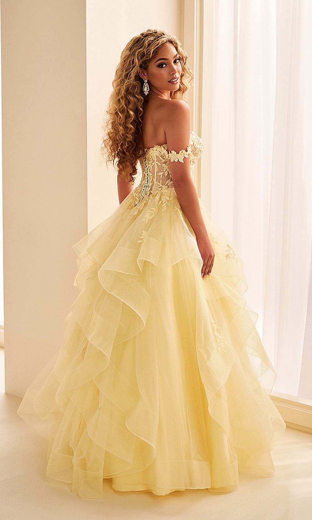 Ellie Wilde EW38220 Light Yellow off-shoulder corset prom dress back view with glitter tulle and lace, corset-back lace-up closure, ballgown silhouette, evening gown.