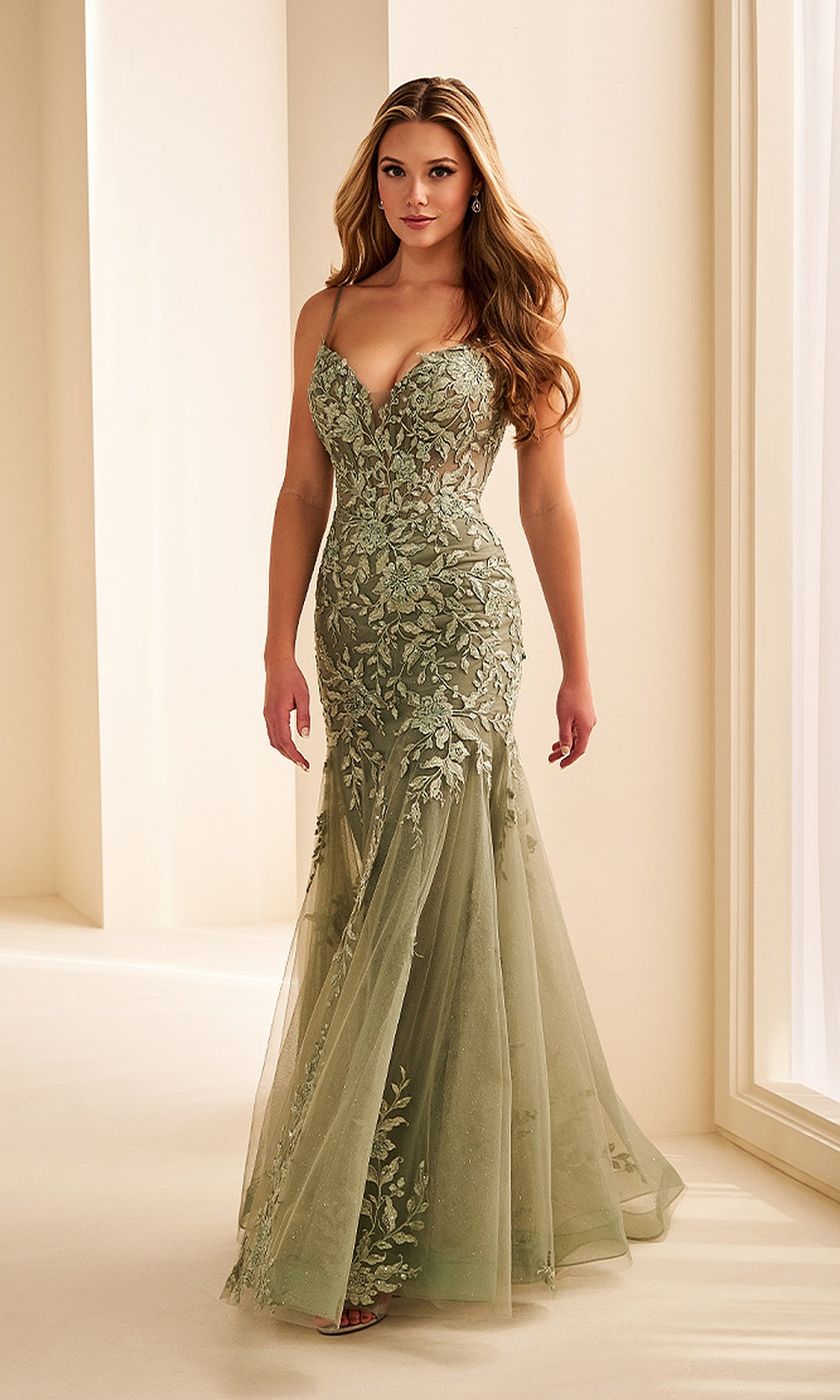 Ellie Wilde EW38223 Sage prom dress front view with glitter tulle, lace floral appliqués, sweetheart neckline, fitted mermaid silhouette, formal prom gown.