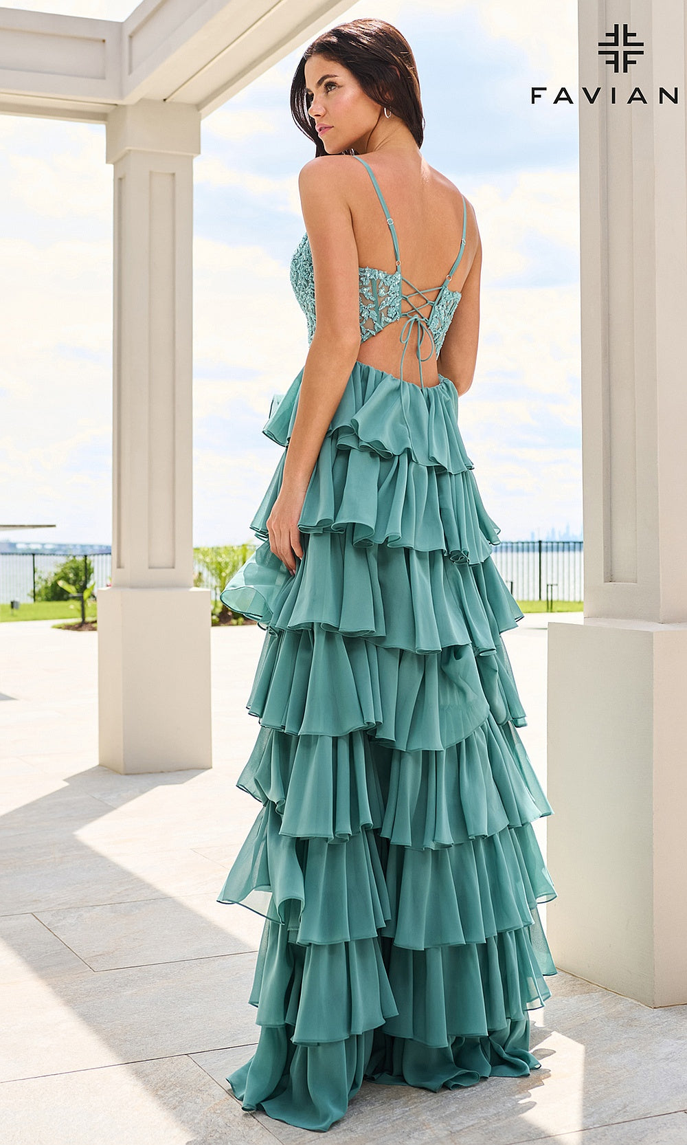 Faviana 11603 Dark Pacific Blue prom dress back view with full open back, crisscross lace-up closure, floral lace bodice, tiered chiffon ruffle skirt, evening gown