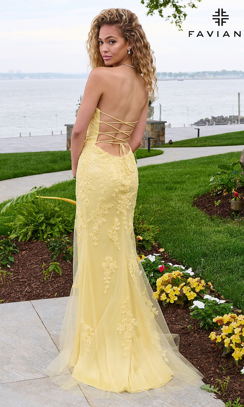 Faviana 11627 Light Yellow back view showing lace-up crisscross construction, entire back bare to waistline, tulle skirt flare, prom season pick