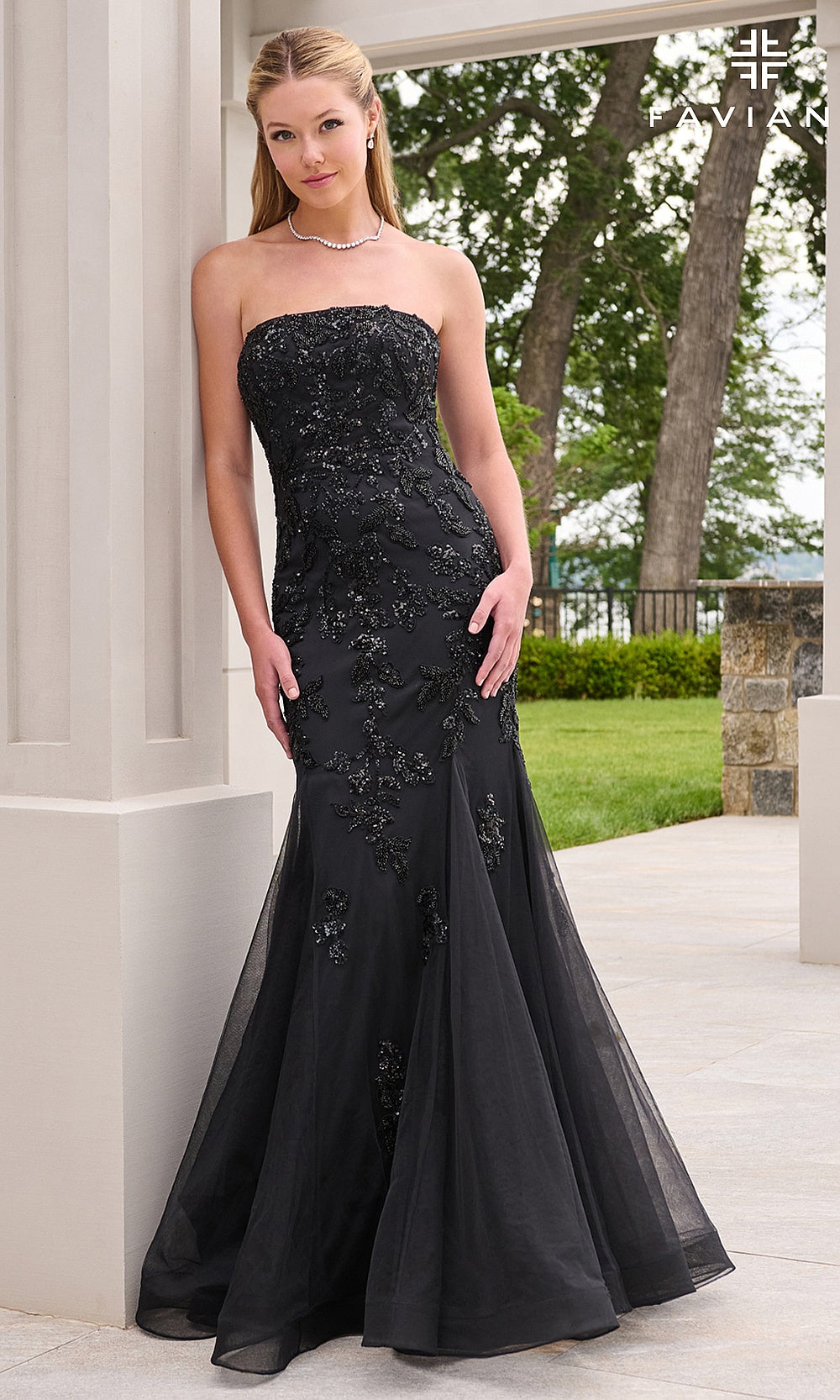 Faviana 11643 Black prom gown front view with tulle skirt, lace-up crisscross open back, beaded floral appliqués, mermaid silhouette, formal prom gown