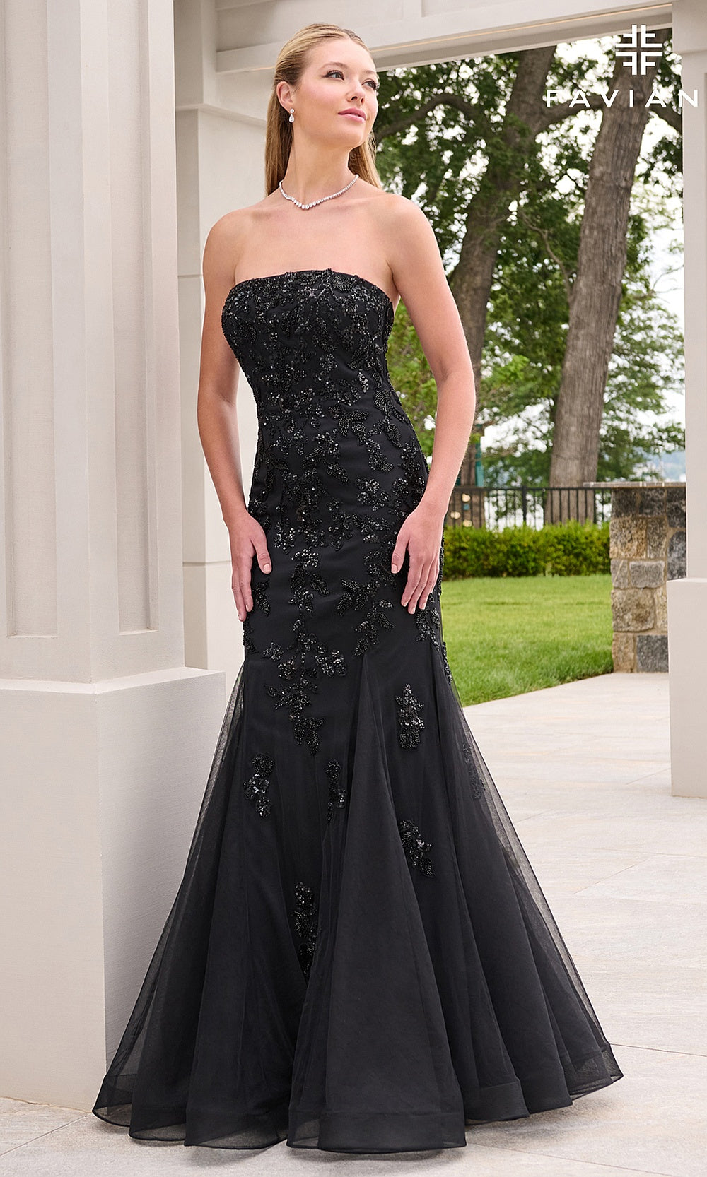 Faviana 11643 Black prom gown full-length front view with tulle skirt, lace-up crisscross open back, beaded floral appliqués, mermaid silhouette, formal prom gown