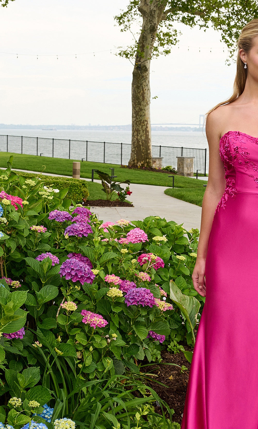 Faviana 11647 Raspberry prom dress side view stretch satin fitted silhouette with sweep train polished formal styling, elegant floor-length silhouette photographed in boutique studio lighting