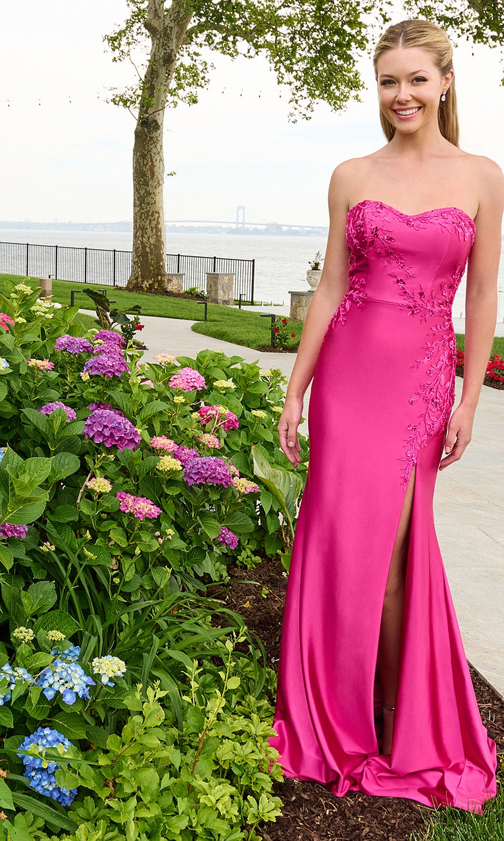 Faviana 11647 Raspberry fitted prom dress front view showing high slit and beaded floral appliqués formal prom gown