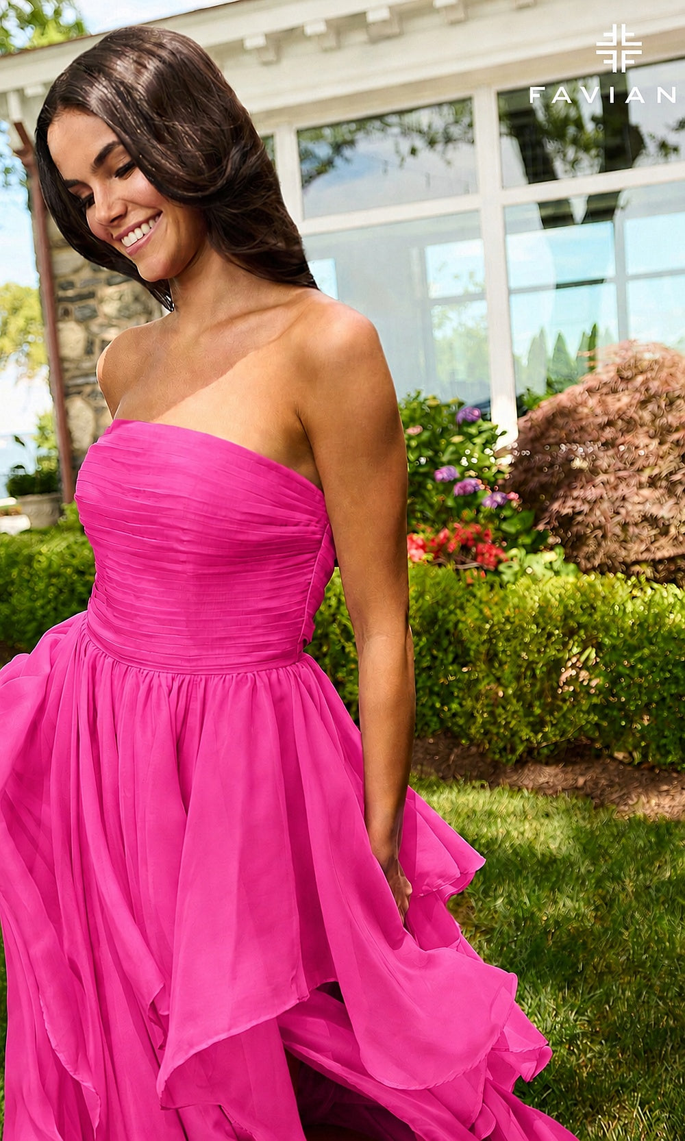Faviana 11669 Electric Pink prom dress detail view with tiered chiffon ruffle skirt layers and horizontal pleated bodice, strapless a-line construction, formal prom gown