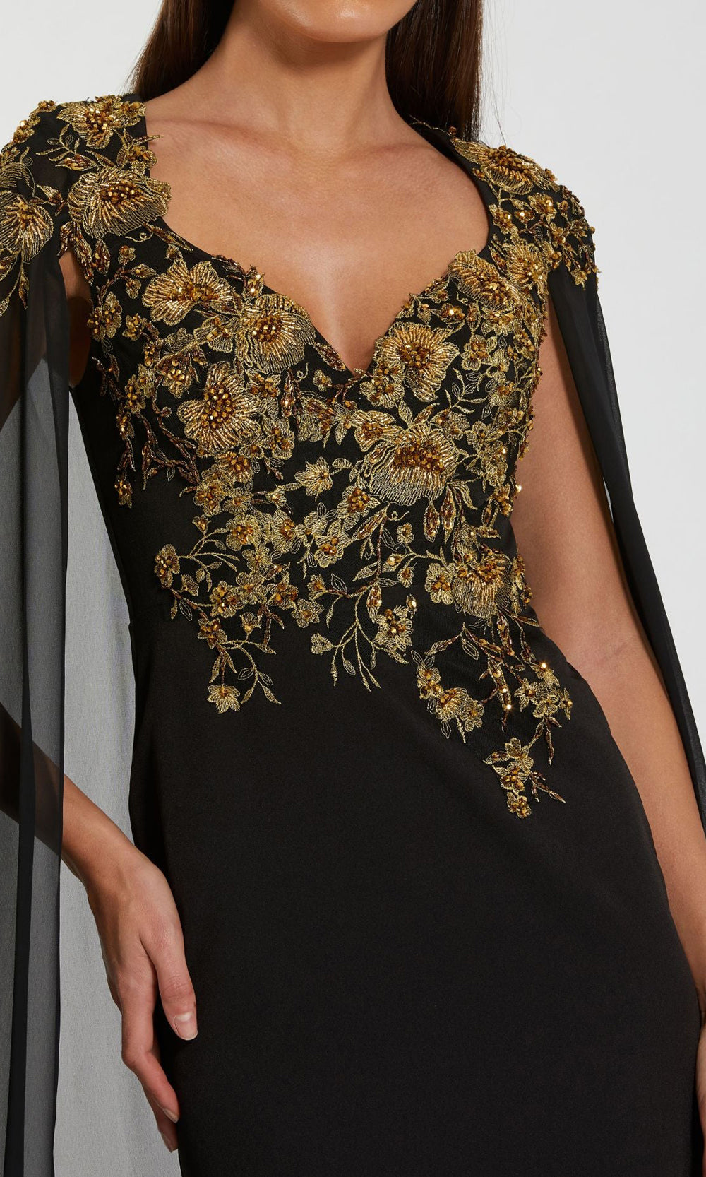 Mac Duggal 13206 black-gold detail view formal gown with close-up gold floral appliqués, dimensional beading and embroidery at v-neckline, evening gown