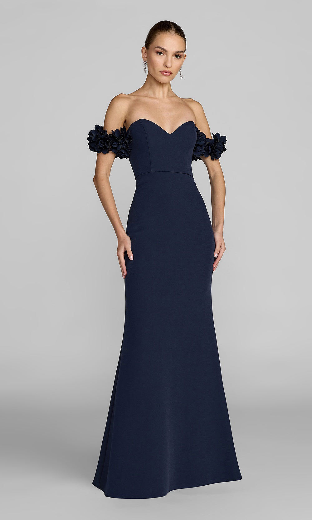 Mac Duggal 56131 midnight-blue front view prom gown with stretch jersey, 3D floral off-shoulder clusters, fitted silhouette, formal prom gown