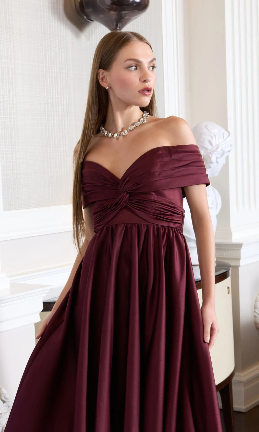 Mac Duggal 56188 wine detail view full A-line ballgown skirt in structured satin with subtle train, empire waistline gather detail, evening gown for formal occasions