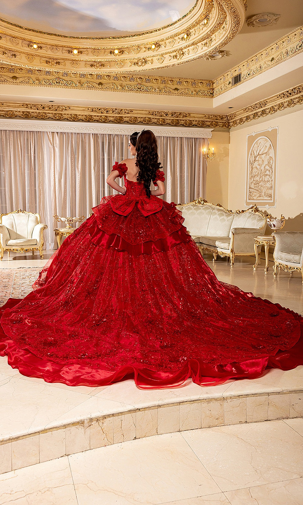 May Queen LK295 red quinceañera gown — back view of the layered ruffle train and sparkling skirt