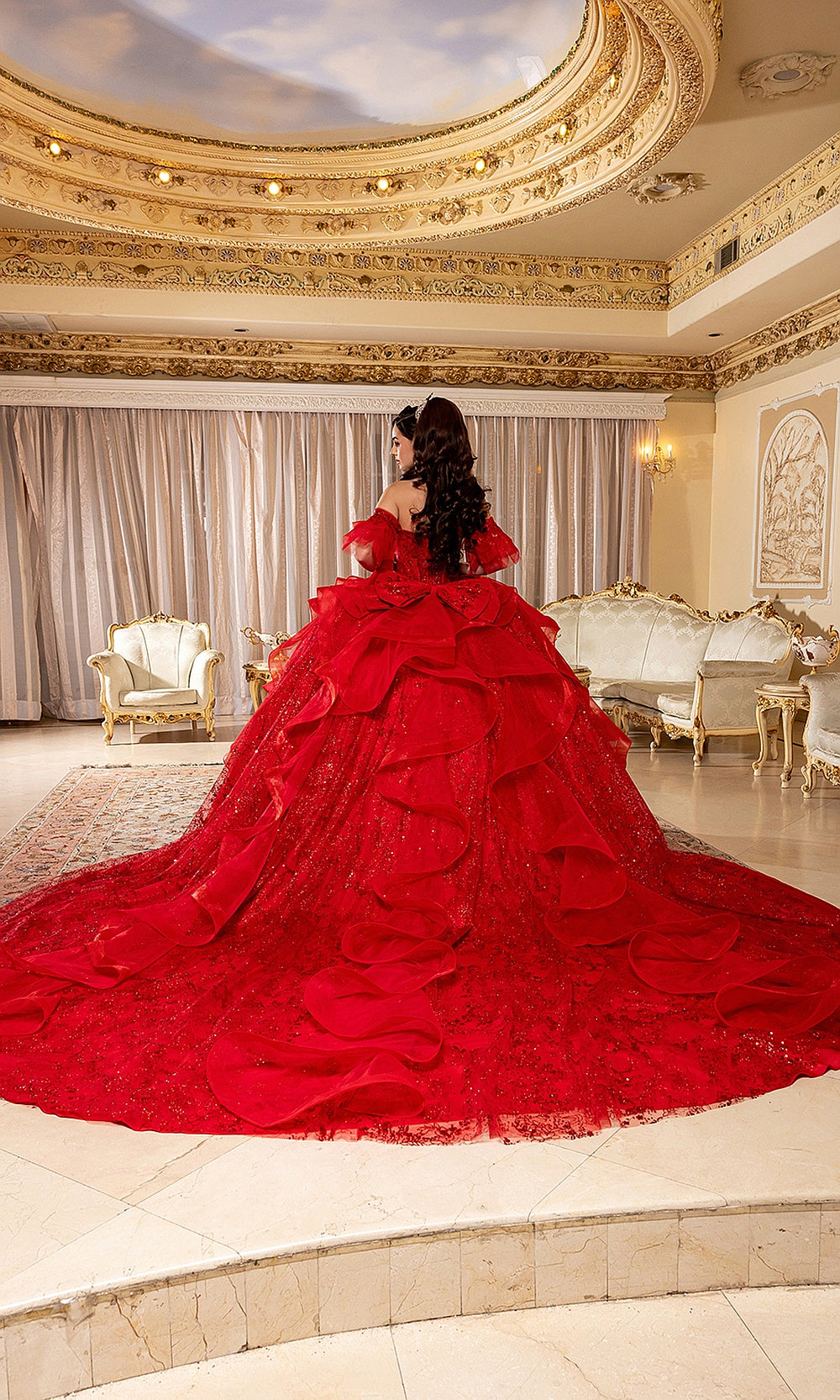 May Queen LK296 red quinceañera ball gown — back view of the tiered ruffle skirt and dramatic train