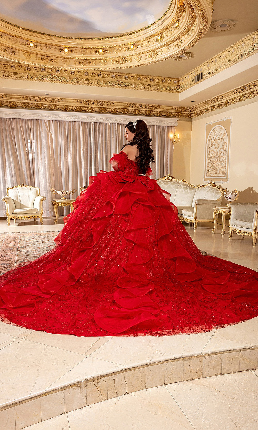 May Queen LK296 red ball gown — angled back view of the layered ruffle quinceañera train