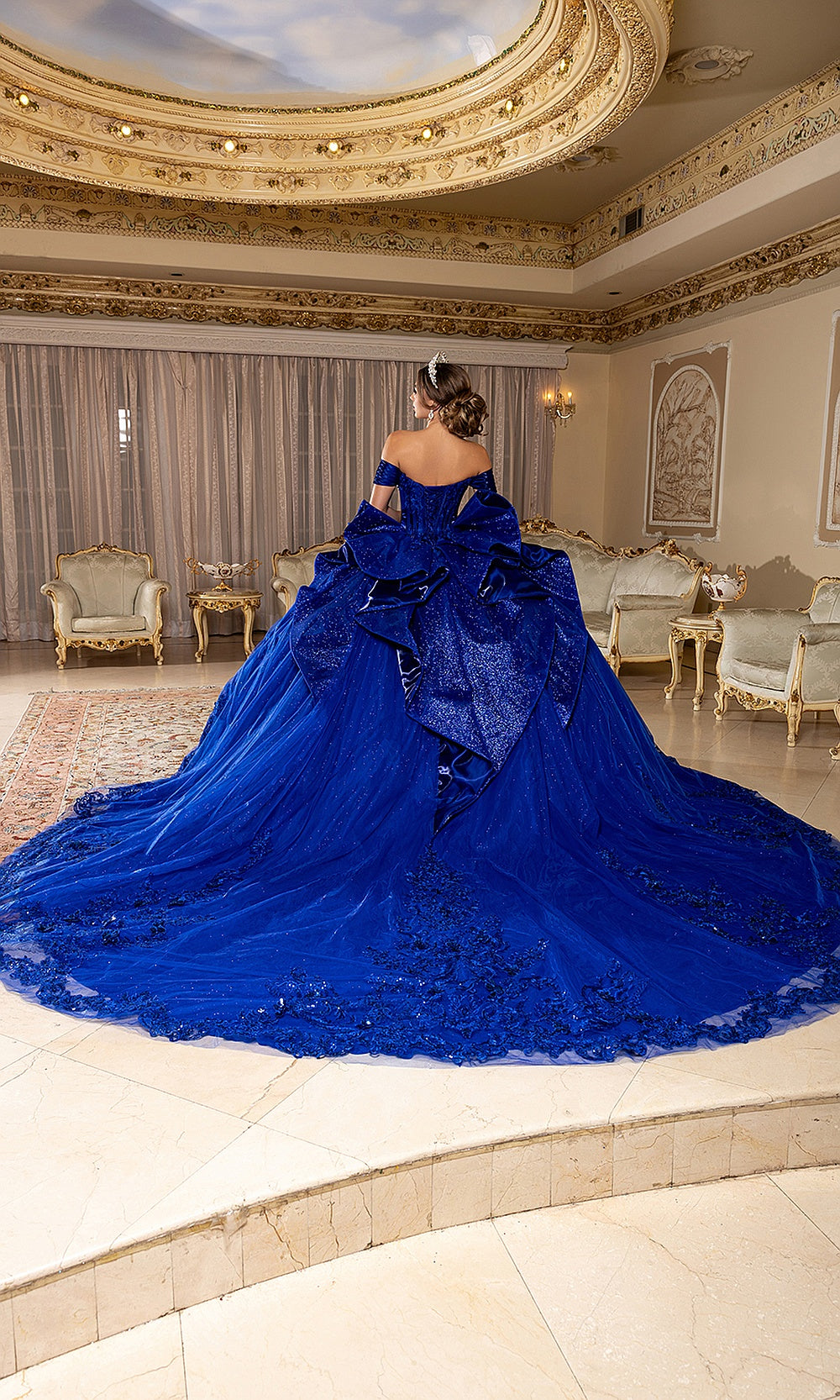 May Queen LK297 royal blue quinceañera gown — back view of the sparkling skirt and sweeping train