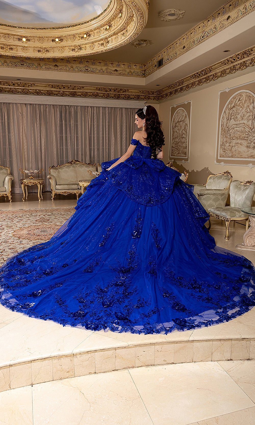 May Queen LK298 royal blue quinceañera gown — back view of the full glitter skirt and sweeping train