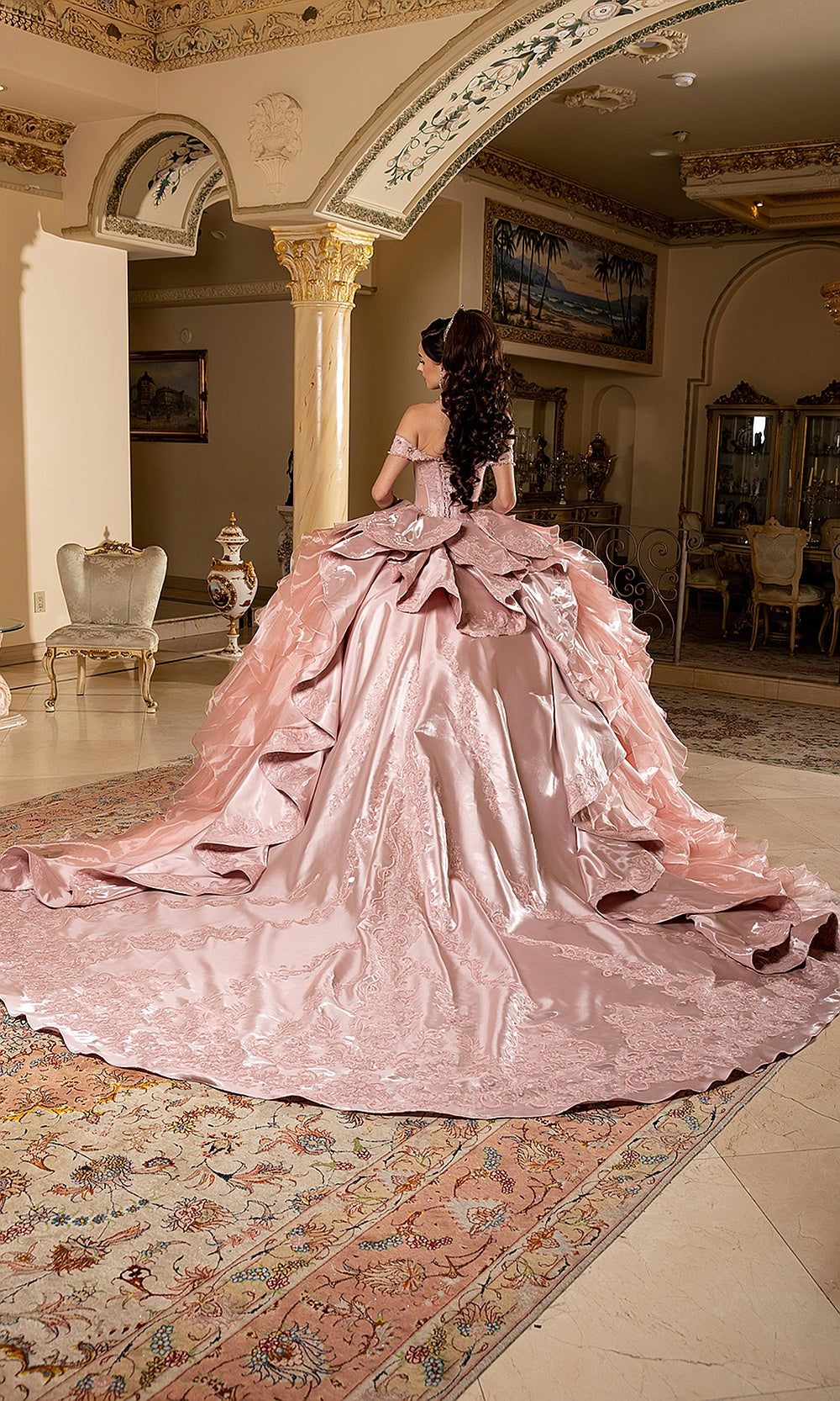 May Queen LK300 rose gold ball gown — back view of the ruffle skirt and sweeping metallic train
