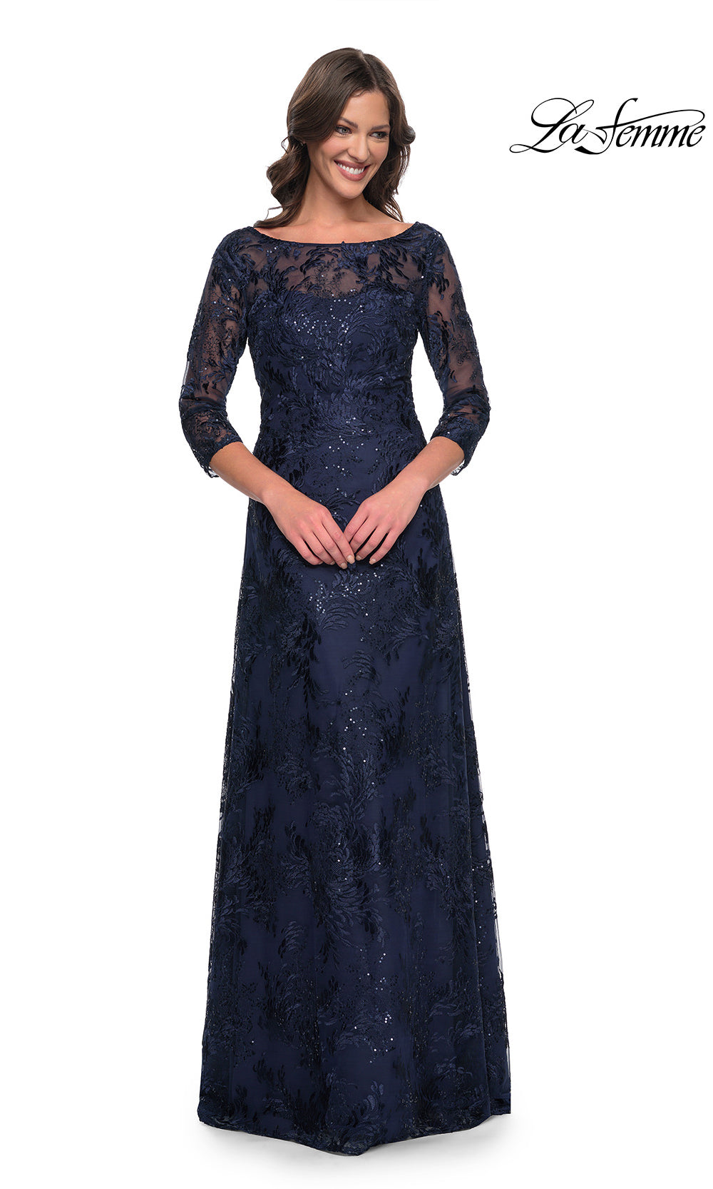 Navy lace evening gown on a white background with 'La Femme' branding.