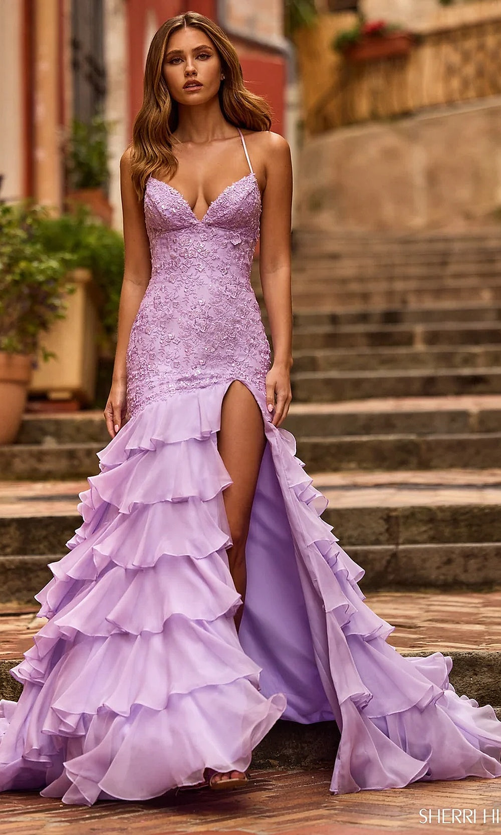 Sherri Hill 57025 Lilac prom dress full view with tiered chiffon ruffle skirt, sweep train, fitted silhouette, red carpet prom styling