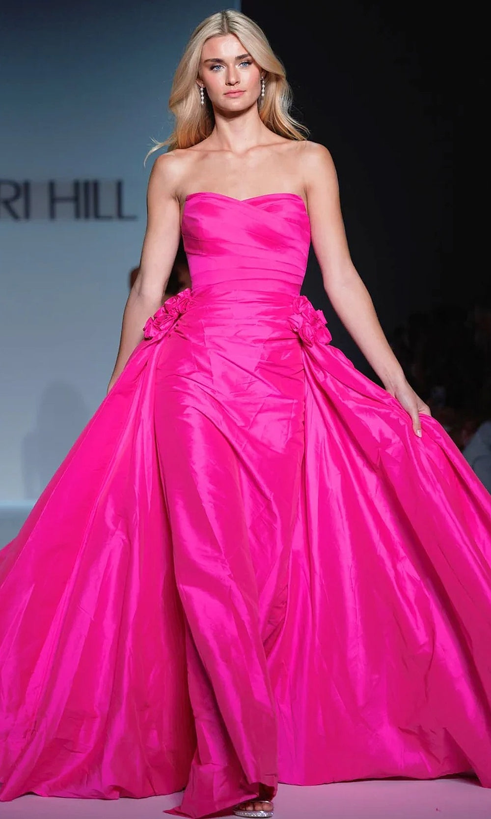 Sherri Hill 57240 Bright Fuchsia prom ballgown with structured satin fabric, 3D floral rosette hip detail, strapless sweetheart neckline, front view, formal prom gown