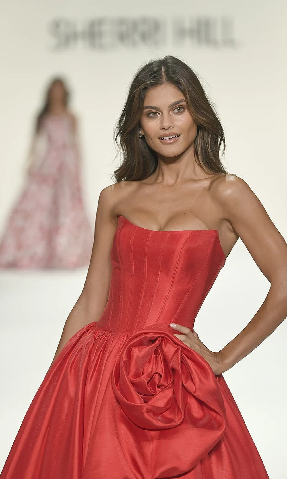 Sherri Hill 57778 Red prom dress detail view boning channels and 3D rose floral appliqué on structured satin corset bodice pageant gown close-up