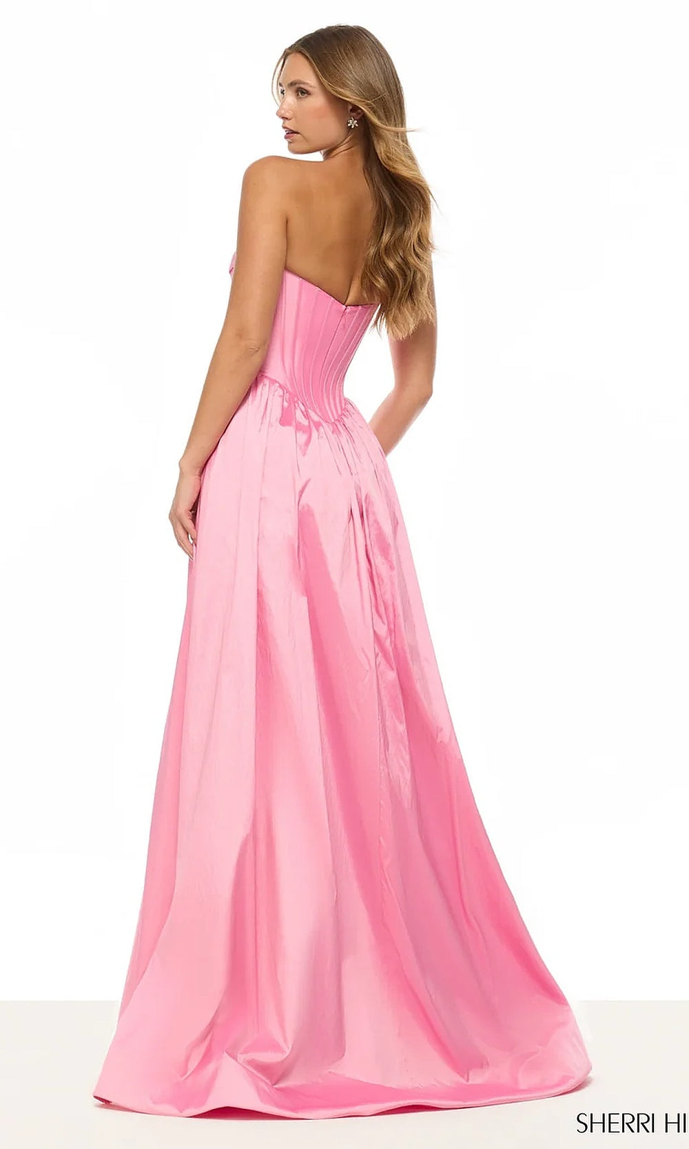 Sherri Hill 57870 Bright Pink prom dress back view with fully open back, boning-channel corset bodice, floor-length pleated skirt, evening gown