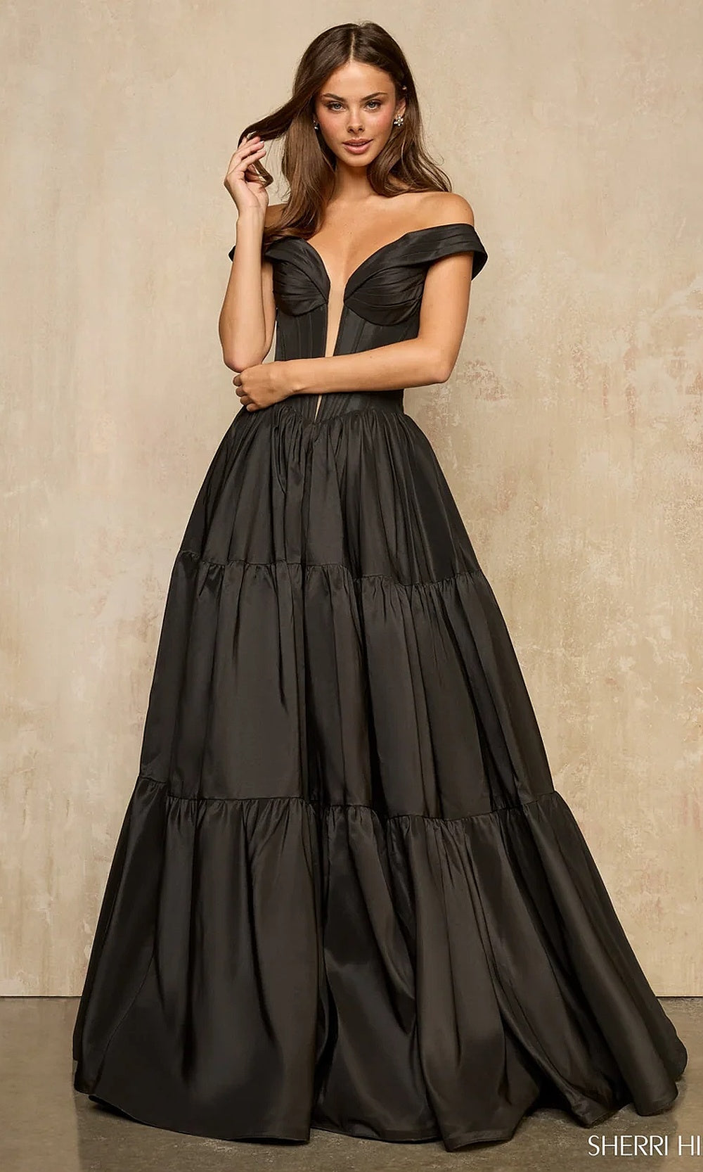 Sherri Hill 57945 Black prom ballgown with voluminous a-line silhouette, structured corset bodice and three-tier ruffle skirt, full view, red carpet styling