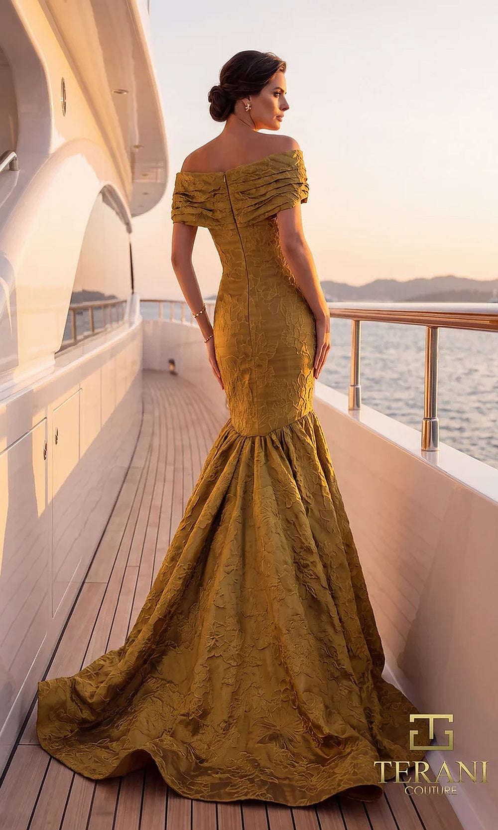 Terani Couture 262E7069 Gold formal evening dress back view with off-shoulder ruched neckline, jacquard mermaid with flared godet skirt, gala gown