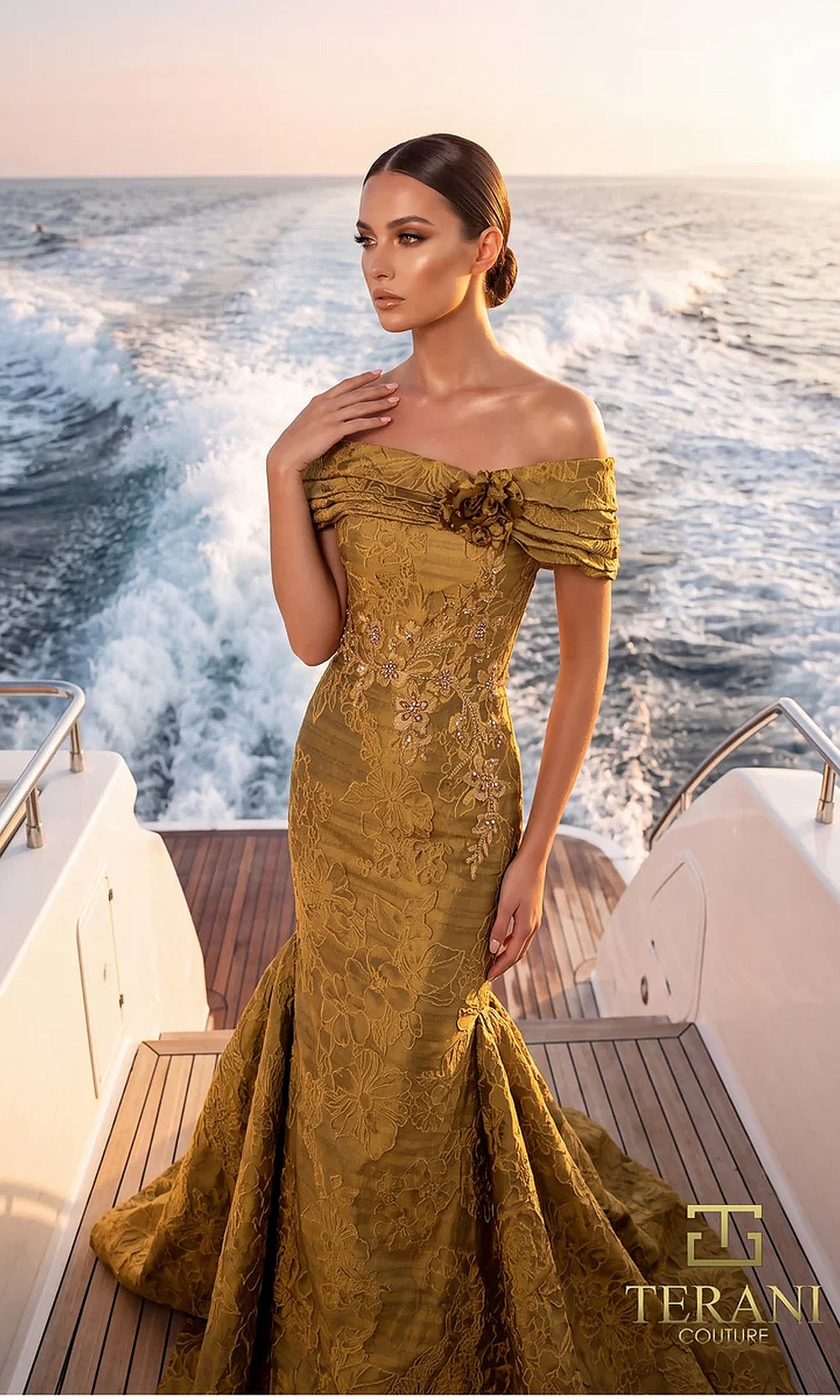 Terani Couture 262E7069 Gold formal evening dress close-up detail view with off-shoulder pleated neckline with rosette, beaded jacquard bodice close-up, evening gown