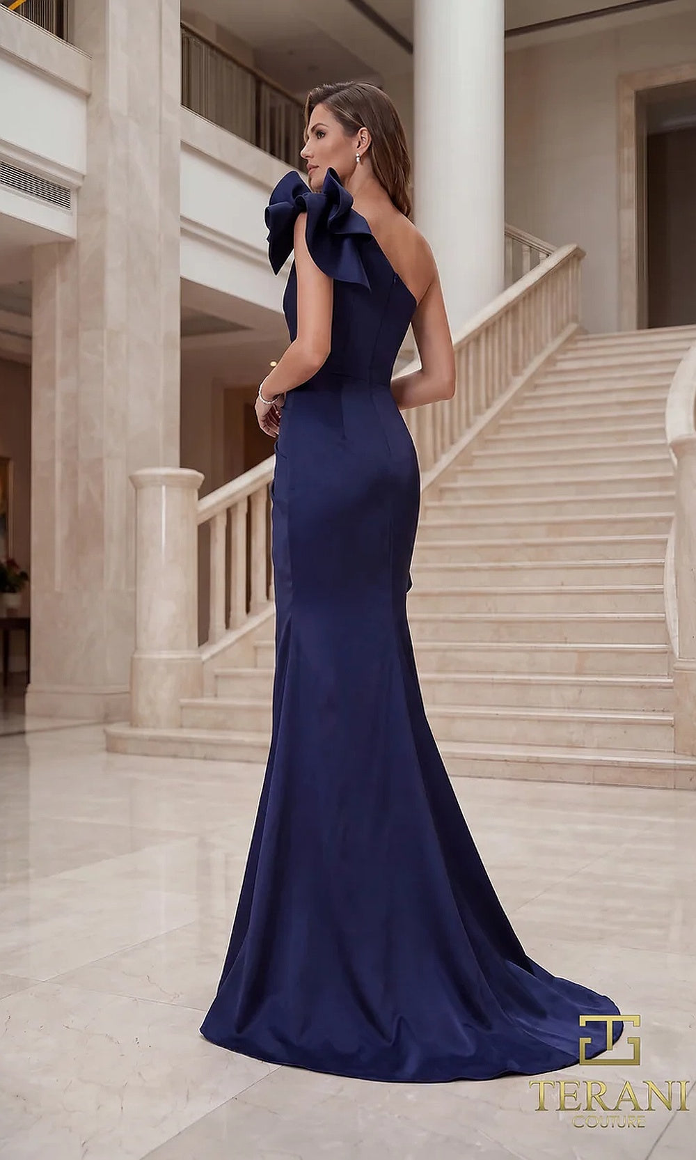 Terani Couture 262E7132 Navy formal evening dress back view with one-shoulder ruffle bow, satin fitted mermaid with sweep train, gala gown