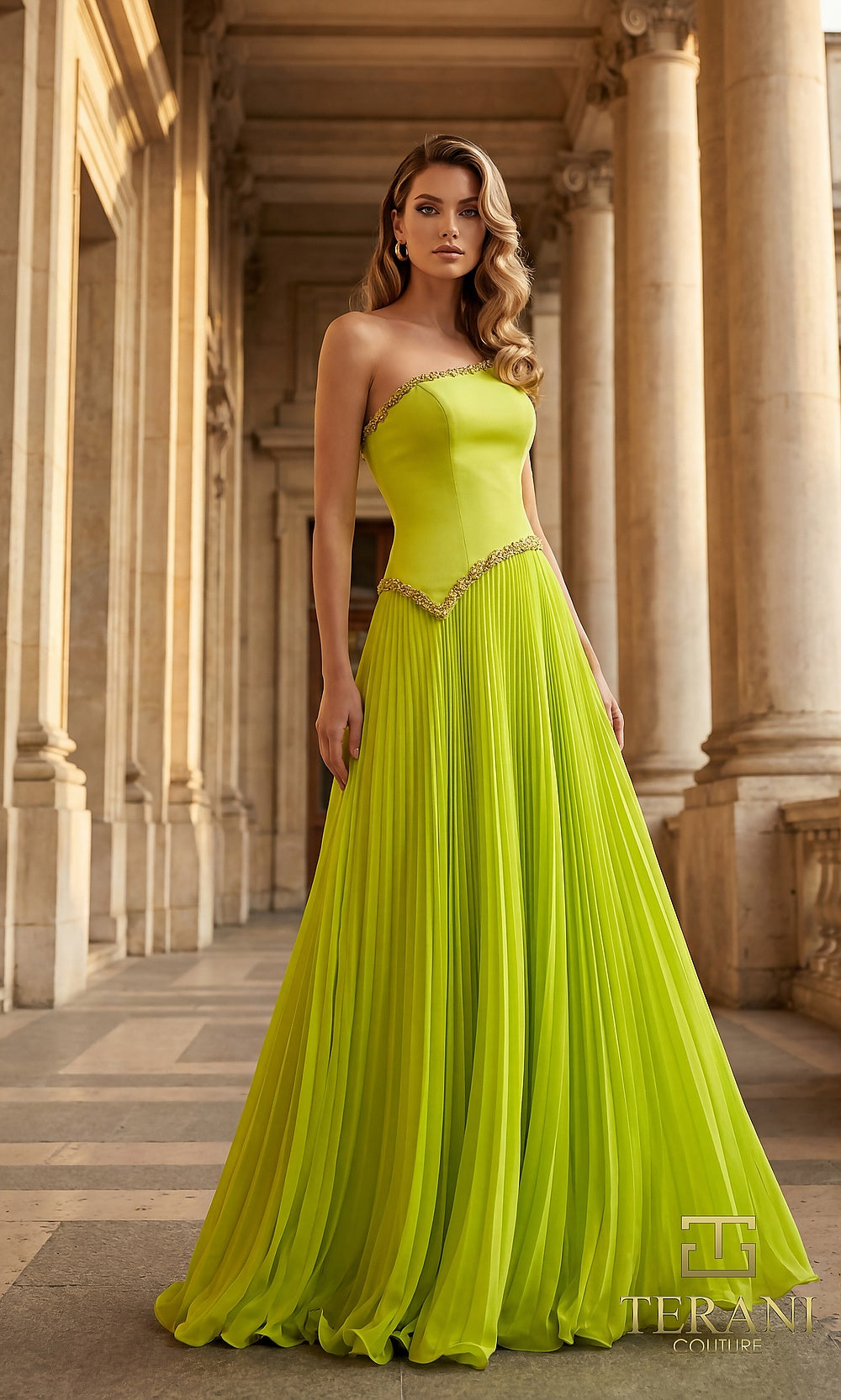 Terani Couture 262E7352 Citrine formal evening dress front view with strapless asymmetric neckline with beaded trim, beaded drop waist, pleated chiffon A-line, evening gown