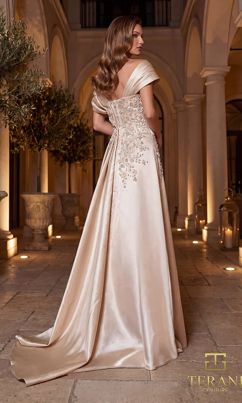 Terani Couture 262M7258 Champagne mother of the bride dress back view with off-shoulder folded neckline, beaded bodice, satin A-line with sweep train, formal wedding celebration dress
