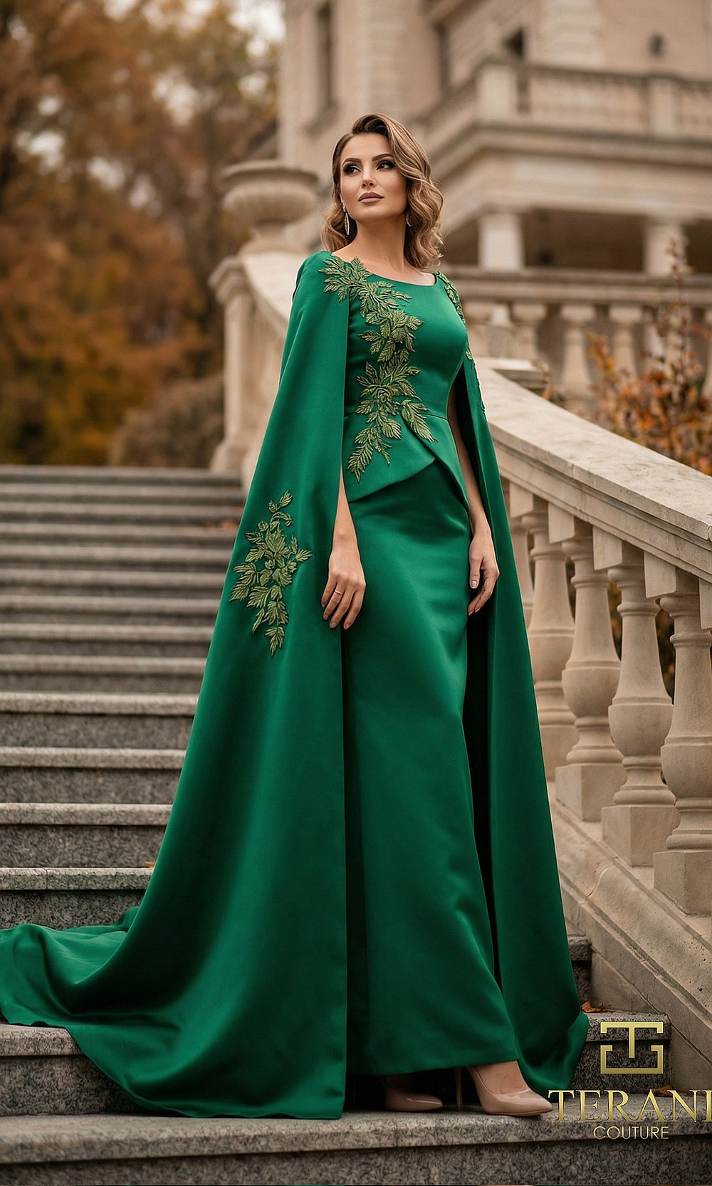 Terani Couture 262M7260 Hunter mother of the bride dress front view with bateau neckline crepe column with floor-length cape sleeves and beaded appliqué, mother of the bride styling