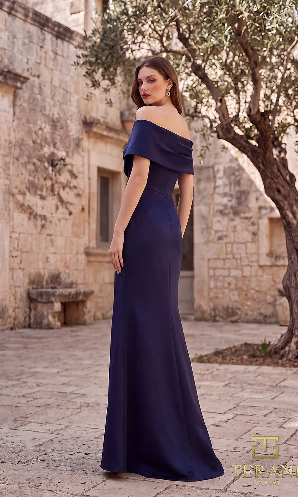 Terani Couture 262M7278 Navy mother of the bride dress back view with off-shoulder folded neckline, satin fitted column with sweep, formal wedding celebration dress